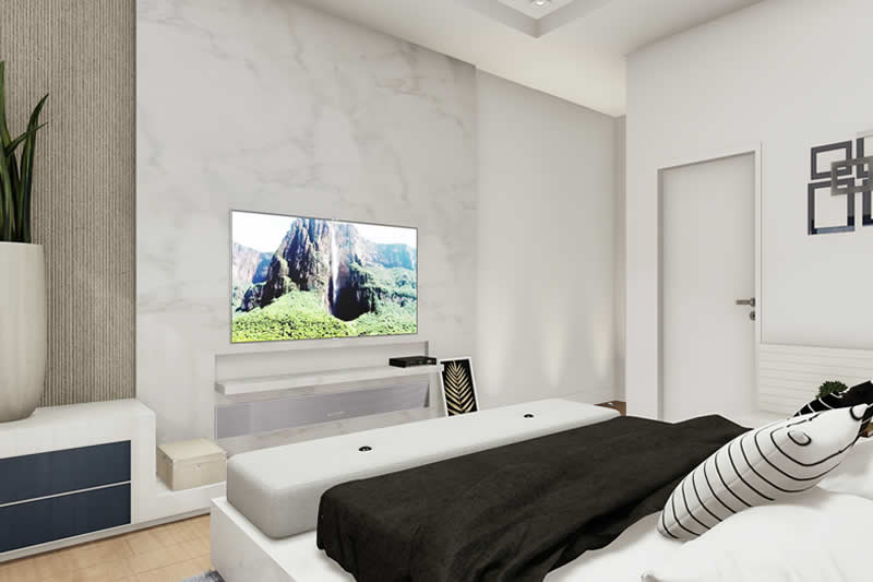 Quarto de casal com baú na frente da cama